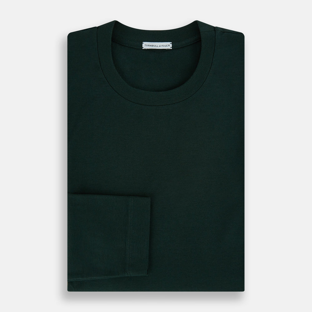 A forest green long-sleeve crewneck t-shirt by Turnbull & Asser is laid flat on a white background, showing the front side with no visible patterns or logos—a timeless, versatile staple.