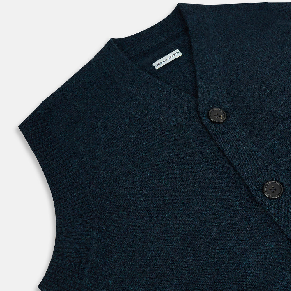 The Turnbull & Asser Dark Green Melange Cashmere Sleeveless Cardigan features ribbed edges, two front pockets, and a round neckline, presented against a plain white background.