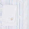 View 4 of product The Turnbull & Asser Pale Blue Multi Stripe Shirt features thin vertical stripes, a contrast collar, and double cuffs, displayed on a plain light background.