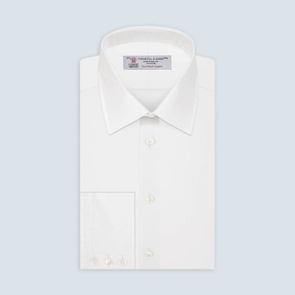 A plain white circle with a thin gray outline on a light gray background, representing Turnbull & Asser’s White Sea Island Quality Cotton Fabric.