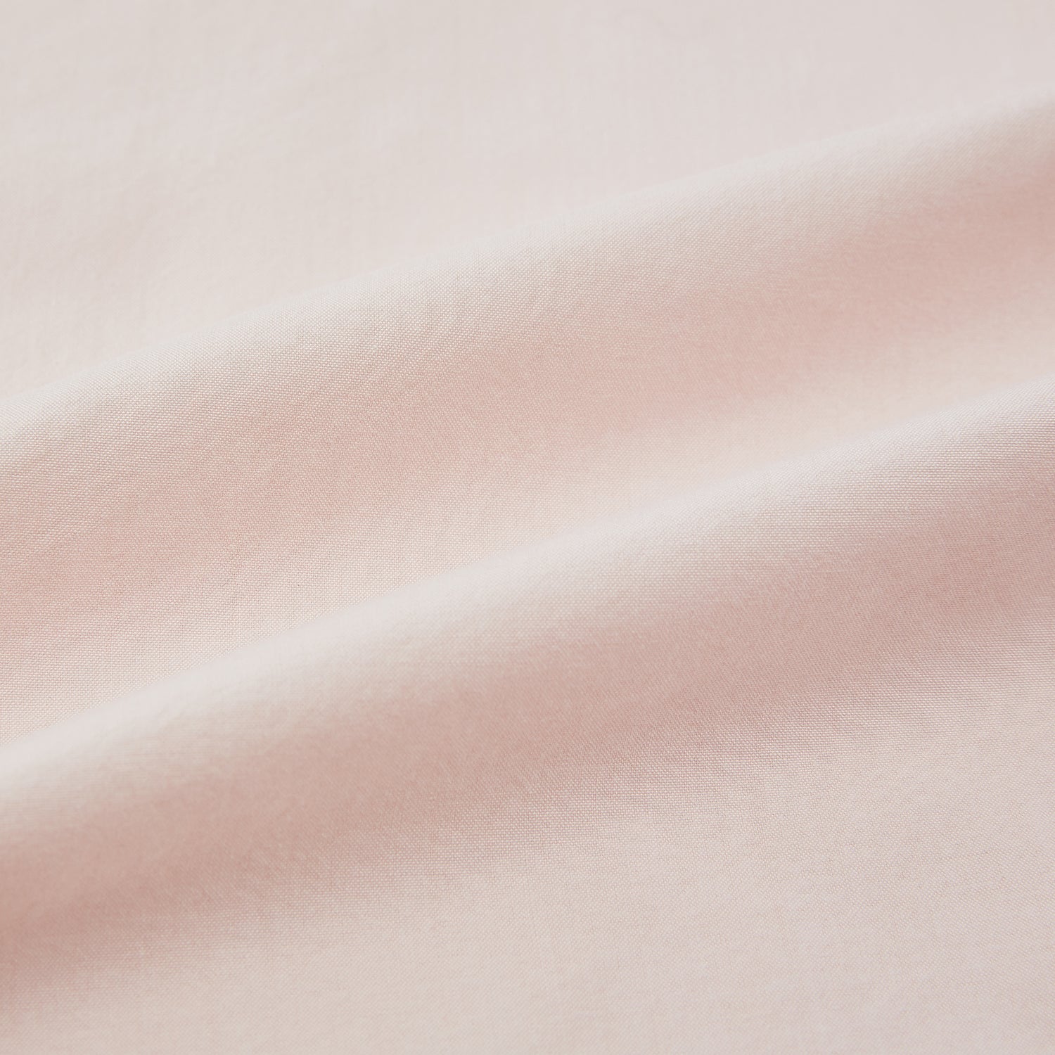 View 6 of product The Turnbull & Asser Pale Pink Hyde Overshirt is a long-sleeve, sanforised cotton button-up with a left chest pocket and dark buttons, shown laid flat on a white background.