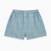 View 3 of product The Pale Blue And Green Multi Check Godfrey Boxer Shorts by Turnbull & Asser feature Italian cotton, an elastic waistband, and a grid of multicolored checks. These luxury men's boxers are shown laid flat on a white background.