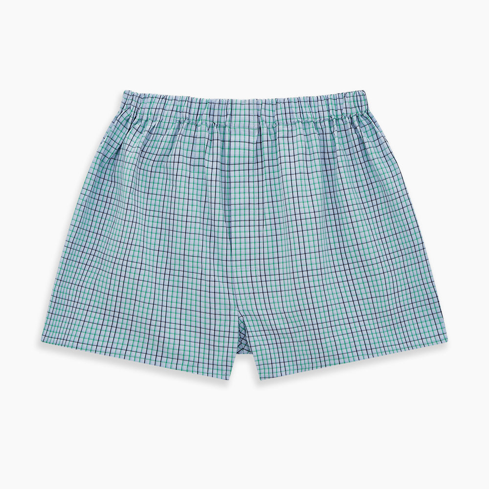 The Pale Blue And Green Multi Check Godfrey Boxer Shorts by Turnbull & Asser feature Italian cotton, an elastic waistband, and a grid of multicolored checks. These luxury men's boxers are shown laid flat on a white background.