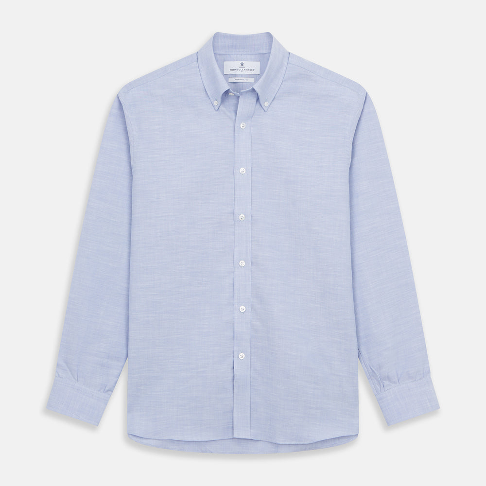 The Turnbull & Asser Pale Blue Weekend Fit Hayne Shirt features a Dorset collar, white buttons, and 1-button cuffs. This casual, long-sleeve button-down is displayed laid flat on a white background.