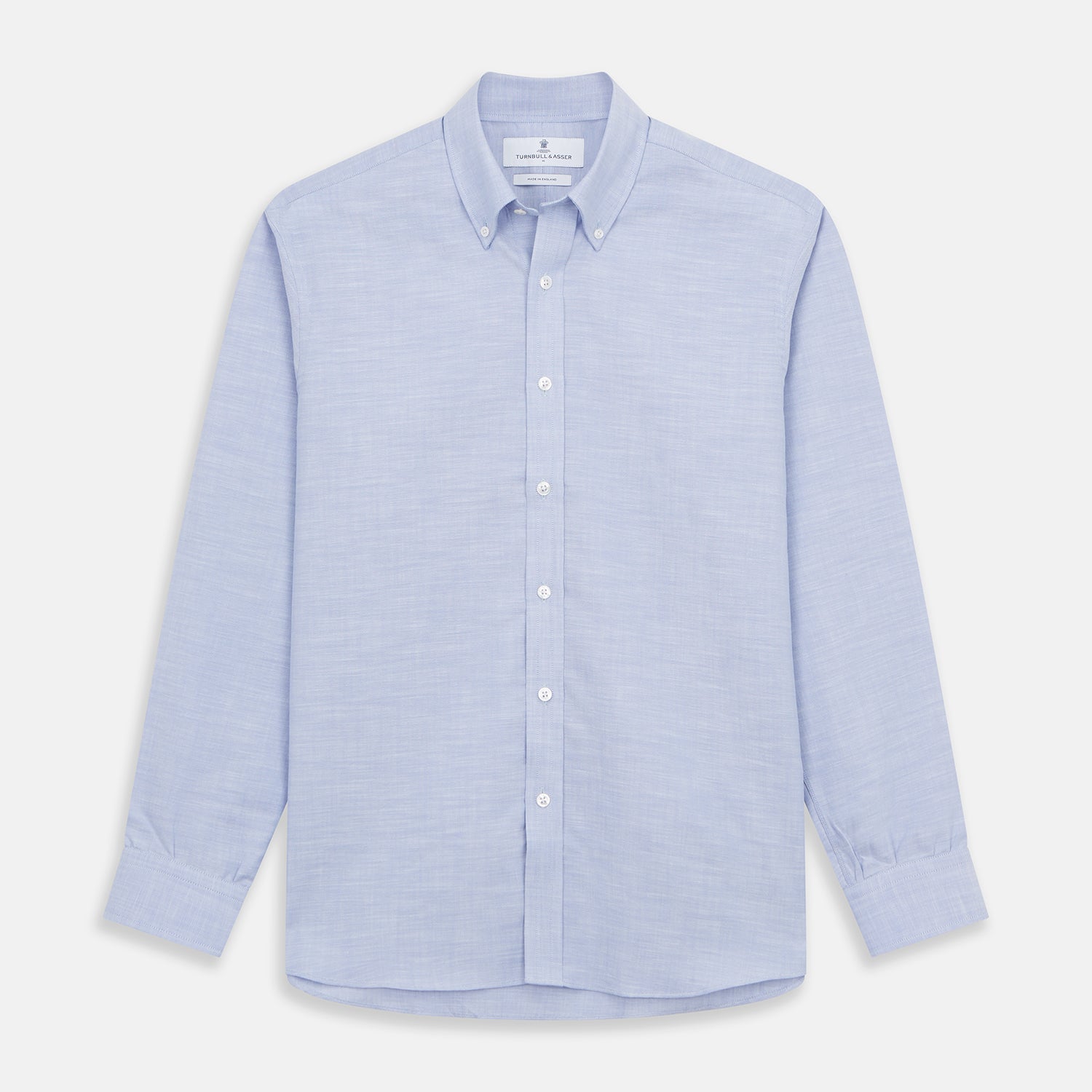View 1 of product The Turnbull & Asser Pale Blue Weekend Fit Hayne Shirt features a Dorset collar, white buttons, and 1-button cuffs. This casual, long-sleeve button-down is displayed laid flat on a white background.