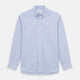 The Turnbull & Asser Pale Blue Weekend Fit Hayne Shirt features a Dorset collar, white buttons, and 1-button cuffs. This casual, long-sleeve button-down is displayed laid flat on a white background.