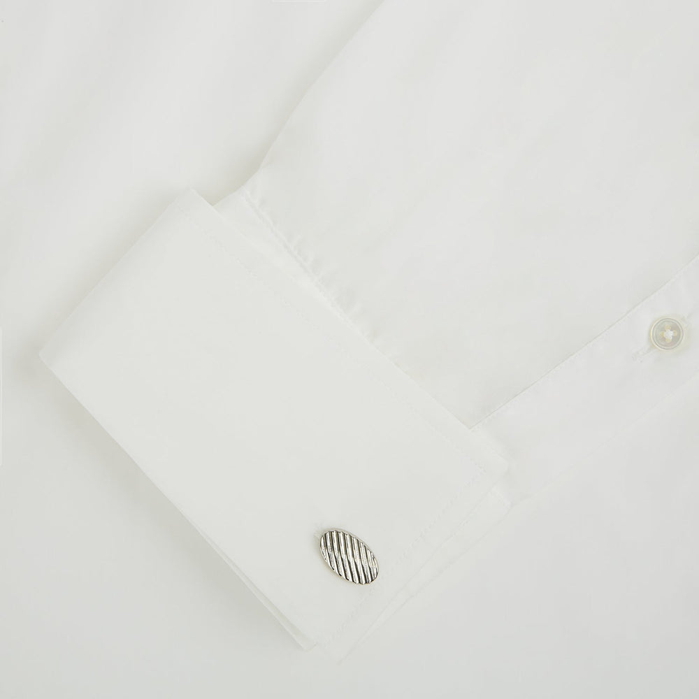 Turnbull & Asser Silver Striped Oval Cufflinks feature a classic diagonal pattern on a silver oval face, displayed against a plain white background.