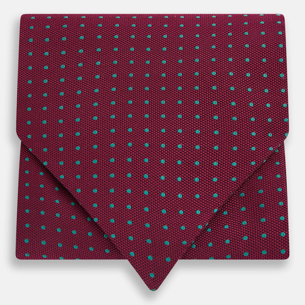 The Turnbull & Asser Blue and Burgundy Micro Dot Silk Cravat features a subtle pattern, making it a refined formal accessory that adds elegance to your outfit.
