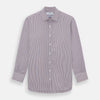 View 1 of product The Turnbull & Asser Burgundy Shadow Stripe Mayfair Shirt is a long-sleeved button-up with thin vertical burgundy stripes, classic collar, and buttoned cuffs, shown laid flat on a white background.