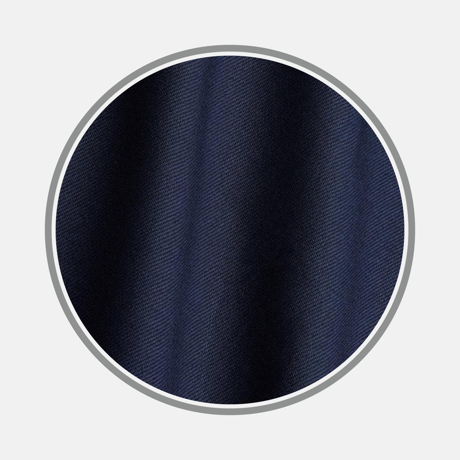 View 1 of product Close-up of Turnbull & Asser Plain Navy Cotton Fabric, featuring a subtle diagonal twill weave. The fabric is shown in a circular frame with a gray border on a light gray background.