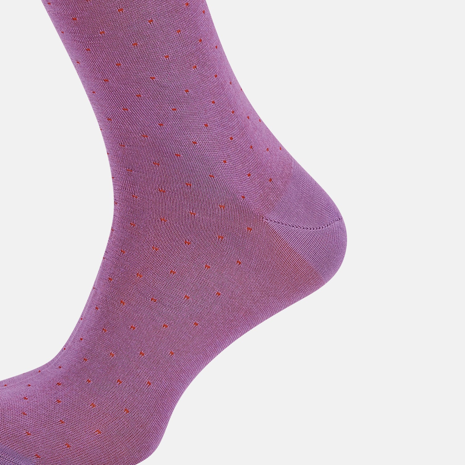 View 4 of product A single Pink/Red Polka Dot Long Sock by Turnbull & Asser, featuring a ribbed cuff and subtle red polka dots, is displayed against a plain white background.