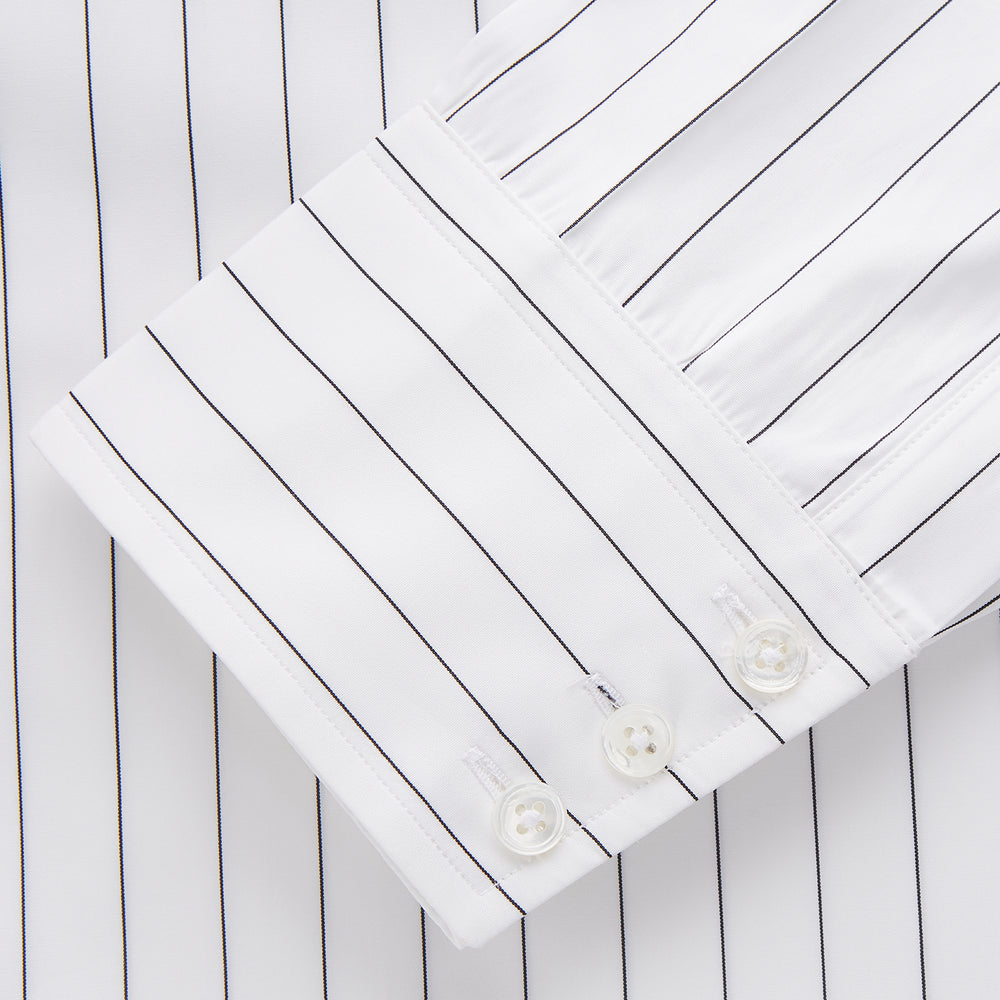 The Turnbull & Asser Black Fine Stripe Cotton Regular Fit Mayfair Shirt features a T&A collar, buttoned cuffs, and black fine stripes, displayed flat on a white background.