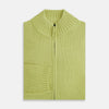View 4 of product The Melon Green Merino High Neck Zipped Cardigan by Turnbull & Asser features long sleeves and ribbed collar, cuffs, and hem, shown on a plain white background.