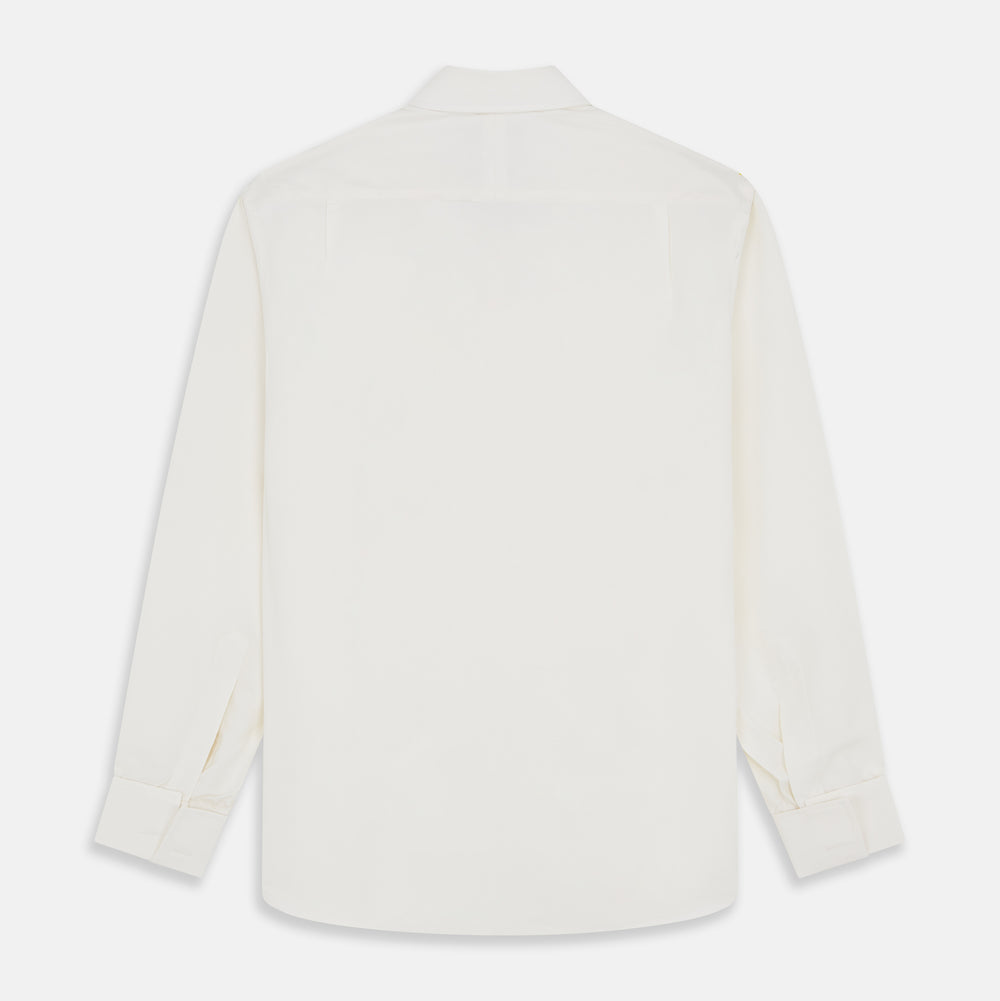 The Cream Silk Whitby Shirt by Turnbull & Asser features a pointed collar, buttoned front and cuffs, and long sleeves, shown in Whitby Fit and laid flat on a white background.