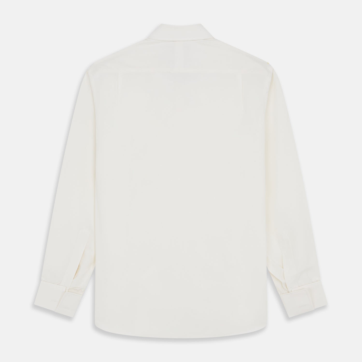 View 3 of product The Cream Silk Whitby Shirt by Turnbull & Asser features a pointed collar, buttoned front and cuffs, and long sleeves, shown in Whitby Fit and laid flat on a white background.