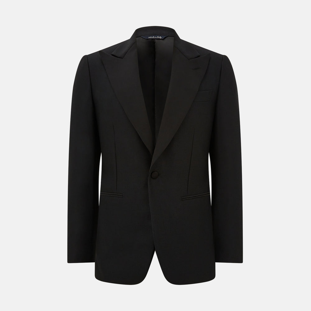The Turnbull & Asser Black Single Breasted Dinner Suit, with satin lapels and matching trousers, is elegantly folded and displayed on a plain white background.