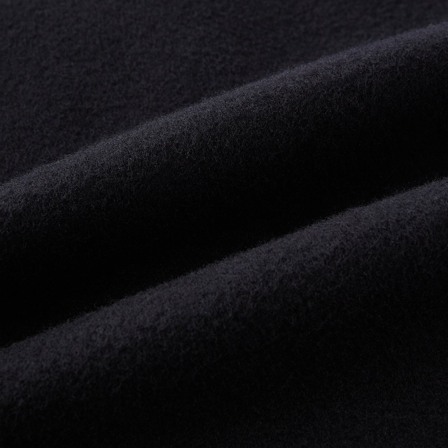 View 5 of product The Navy Apsley Single-Breasted Caban Coat by Turnbull & Asser features three buttons, notch lapels, a chest pocket, and two front flap pockets, shown against a plain light gray background.