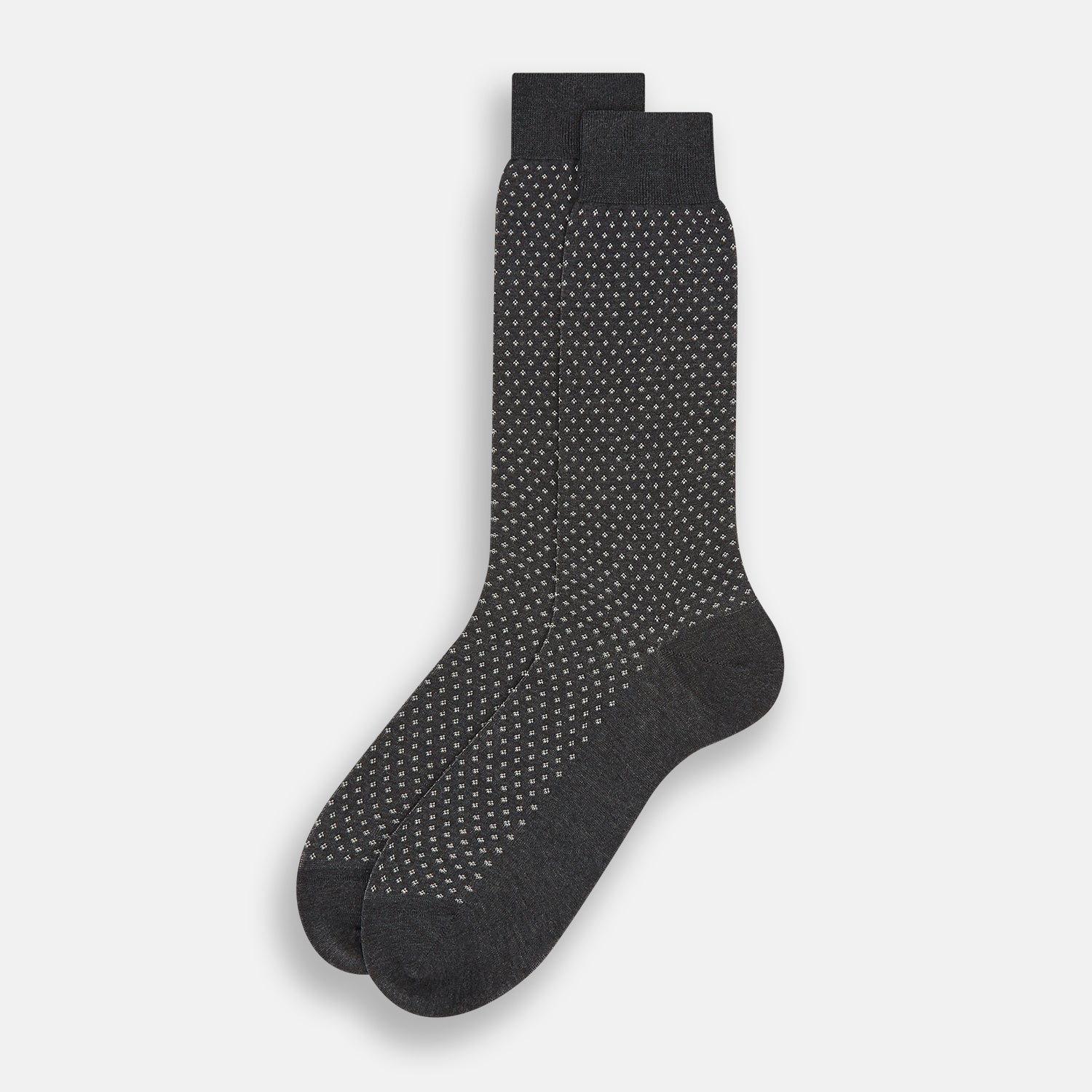 View 2 of product Turnbull & Asser Grey Motif Mid-Length Sock, crafted from Egyptian cotton, features a fine white geometric dot pattern on grey with a solid black cuff, heel, and toe for classic style. Displayed on a white background.