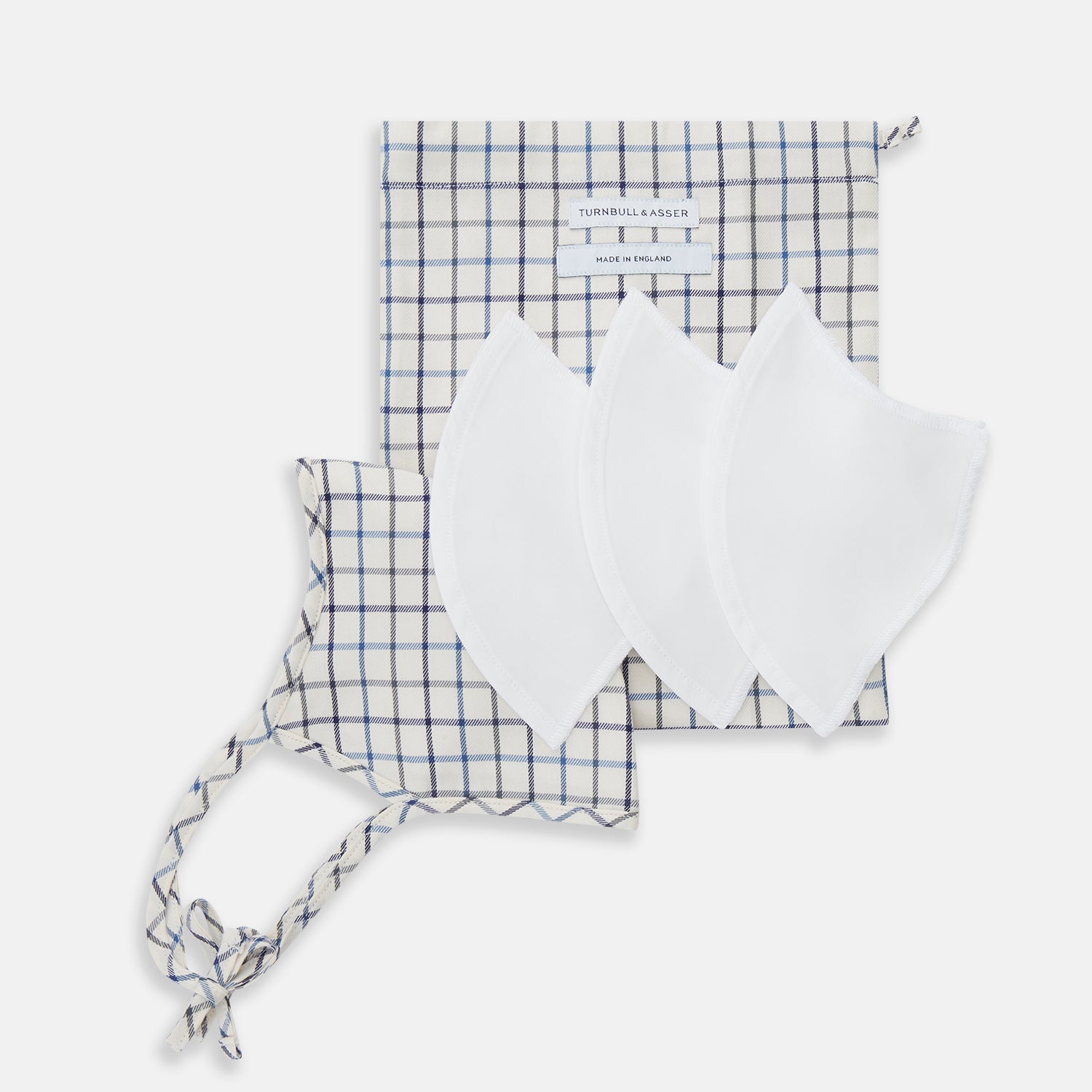 View 6 of product The Turnbull & Asser Check Blue Multi Commuter Mask features a blue plaid design, adjustable fabric ear loops tied in bows, and comes with 3 Viroformula™ filters. Laid flat on a white background.