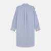 View 5 of product The Blue and Navy Halo Stripe Cotton Sussex Nightshirt by Turnbull & Asser features long sleeves, a collar, button-down front, chest pocket, curved hem, and brown piping for a classic luxury sleepwear style.