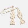 View 2 of product The Yellow Geometric Rings Silk Bow Tie by Turnbull & Asser features interlocking rings in a bold geometric pattern, crafted from silk.