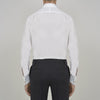 View 3 of product A Turnbull & Asser Two-Fold 200 White Cotton Shirt with T&A collar and double cuffs, neatly folded to show the label inside the collar, is displayed on a light blue background.