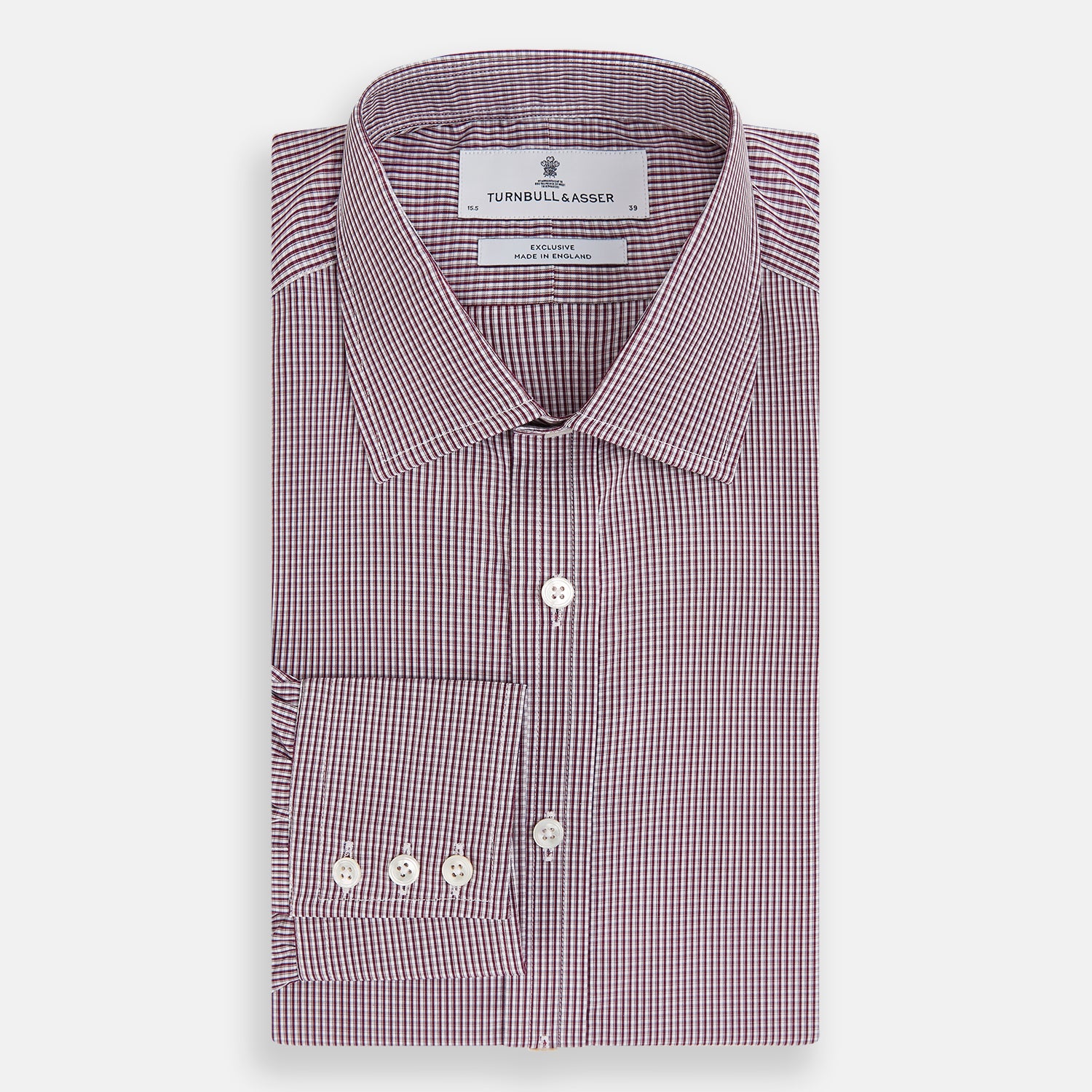 View 5 of product The Turnbull & Asser Burgundy Micro Check Mayfair Shirt features long sleeves, a pointed collar, and white buttons—perfect for formal wear. Shown laid flat on a white background.