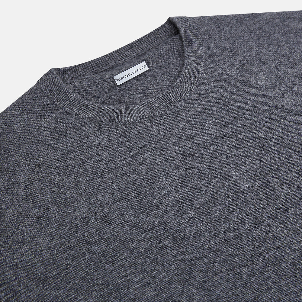 The Turnbull & Asser Melange Grey Crew Neck Cashmere Jumper, a smart-casual long-sleeve sweater, is shown on a white background.