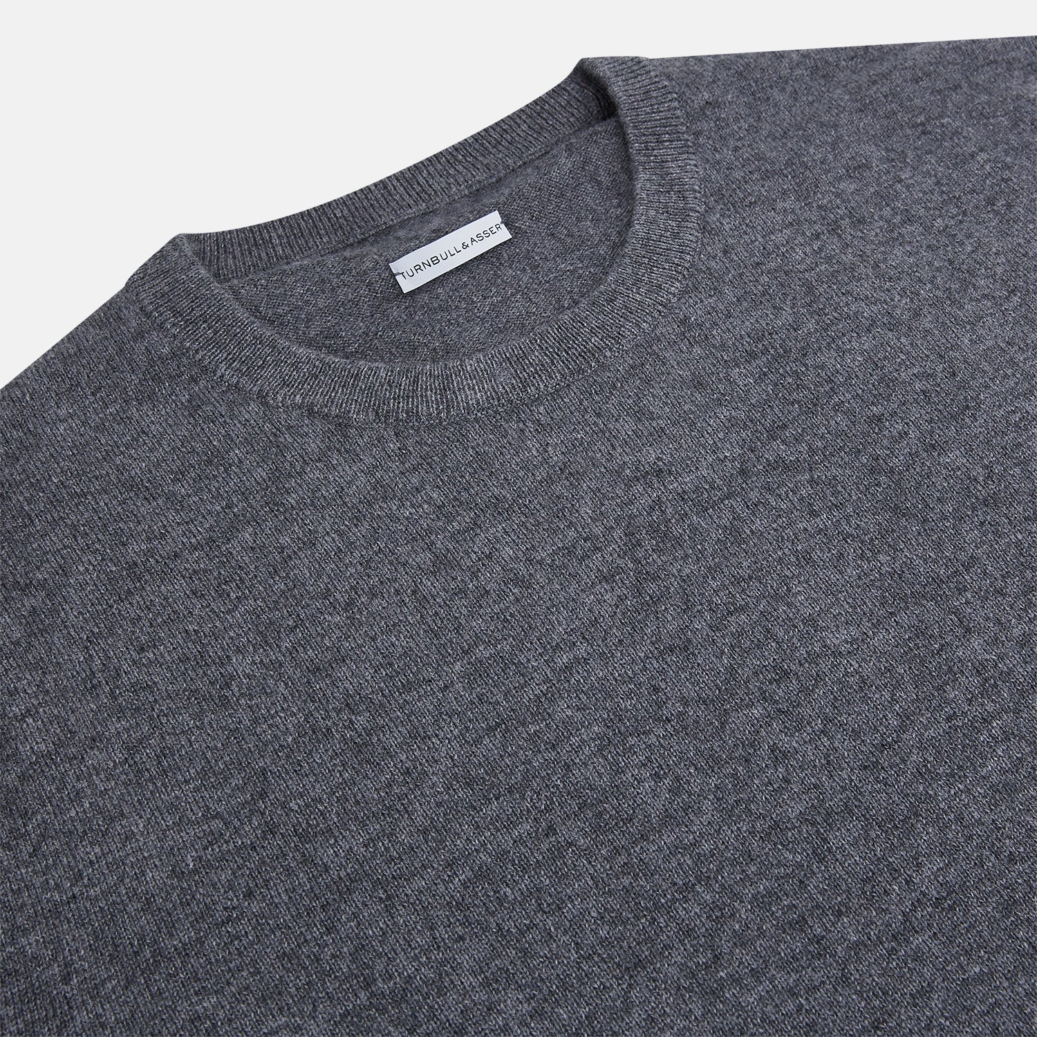 View 2 of product The Turnbull & Asser Melange Grey Crew Neck Cashmere Jumper, a smart-casual long-sleeve sweater, is shown on a white background.