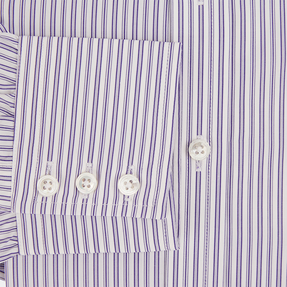 The Turnbull & Asser Purple Ticking Stripe Mayfair Shirt is a long-sleeve button-up with a T&A collar and slim blue-and-white vertical stripes, shown on a white background.