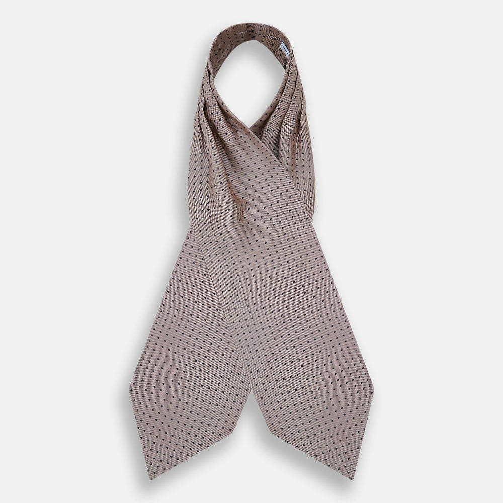 The Turnbull & Asser Navy and Lilac Micro Dot Silk Cravat features a refined pattern, making it perfect for pairing with pocket squares or to elevate any dress code with its sophisticated handmade style.