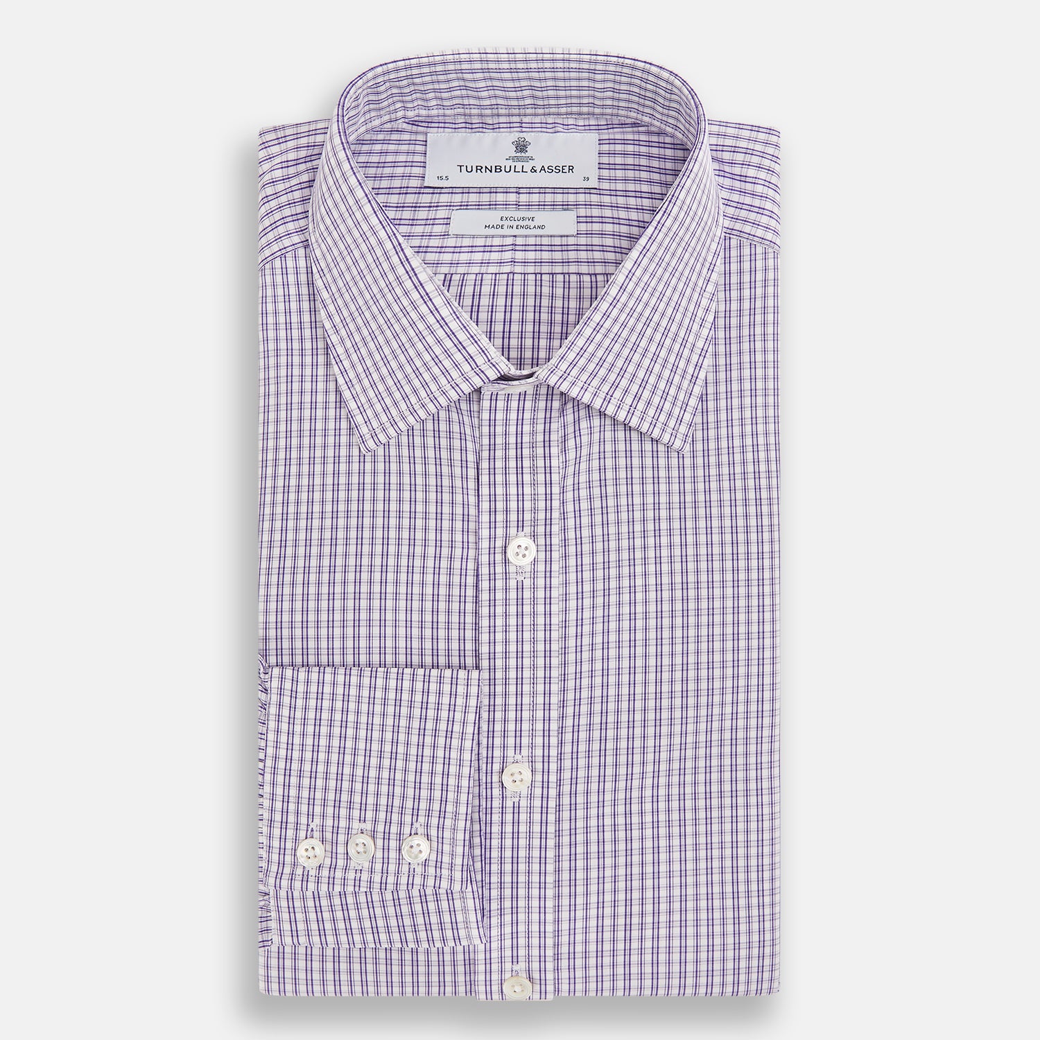 View 5 of product The Turnbull & Asser Purple Double Graph Check Mayfair Shirt is a long-sleeved, button-up dress shirt with a T&A collar and small blue and white check pattern, shown against a white background.