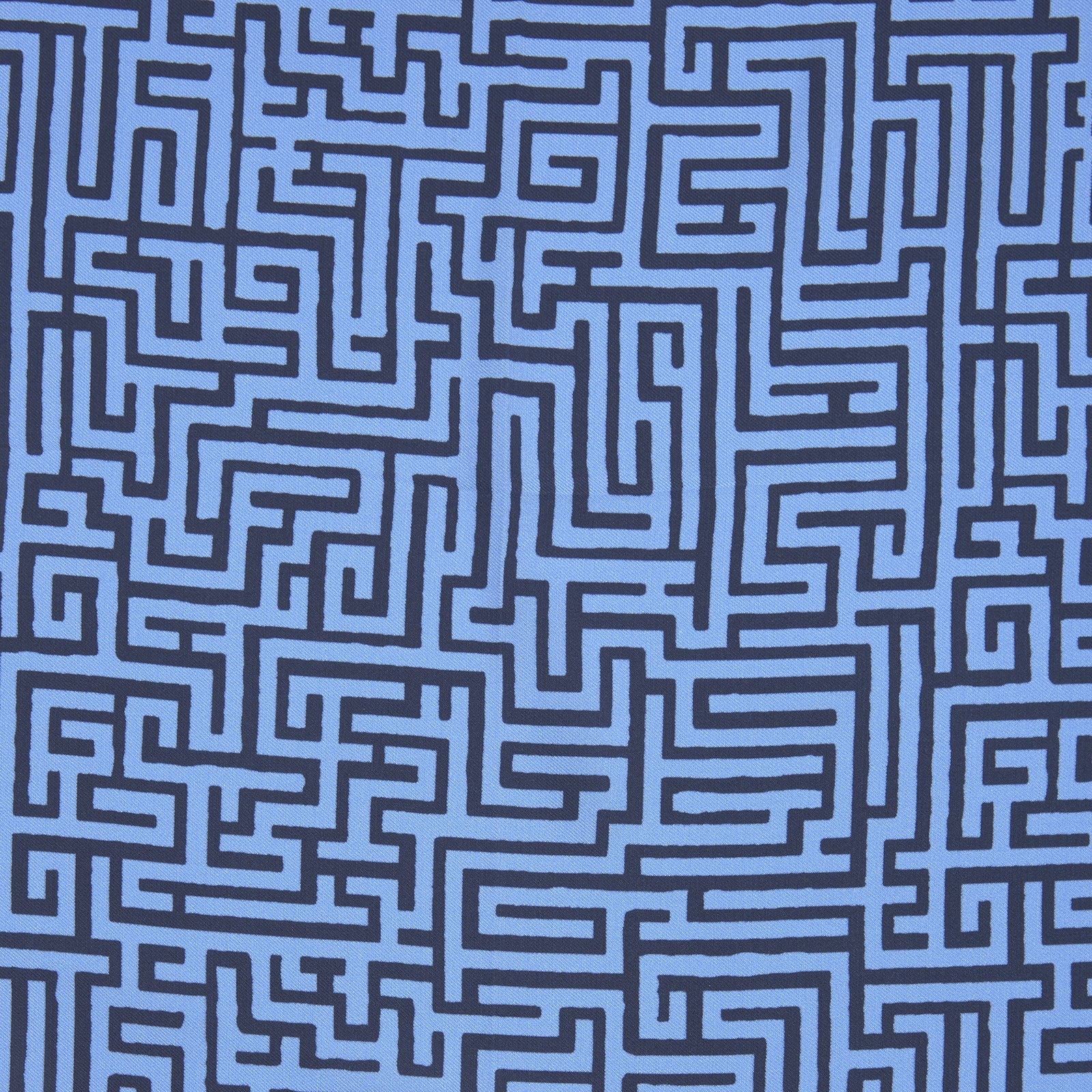 View 3 of product The Blue Maze Silk Pocket Square by Turnbull & Asser features a geometric maze-inspired pattern and central logo, with a folded corner for an artful touch.