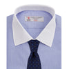 View 4 of product The Wall Street Shirt with White T&A Collar by Turnbull & Asser, as seen on Gordon Gekko, is folded neatly to showcase its light purple color, crisp French cuffs, and iconic contrasting collar against a plain background.