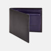 View 1 of product The Turnbull & Asser Bill Coin Wallet is a black leather bifold with a visible purple interior, card slots, and a coin pocket.