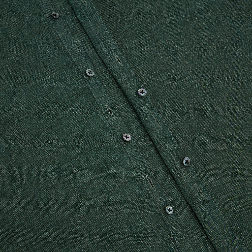 The Forest Green Linen Westminster Shirt by Turnbull & Asser features long sleeves, a Turnbull collar, and a button-up design, shown laid flat on a white background.