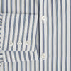 View 4 of product The SAPPHIRE BLUE MULTI TRACK STRIPE WINDSOR SHIRT by Turnbull & Asser features long sleeves, button-up front, classic collar, blue and white vertical stripes, buttoned cuffs, and showcases British craftsmanship on a white background.