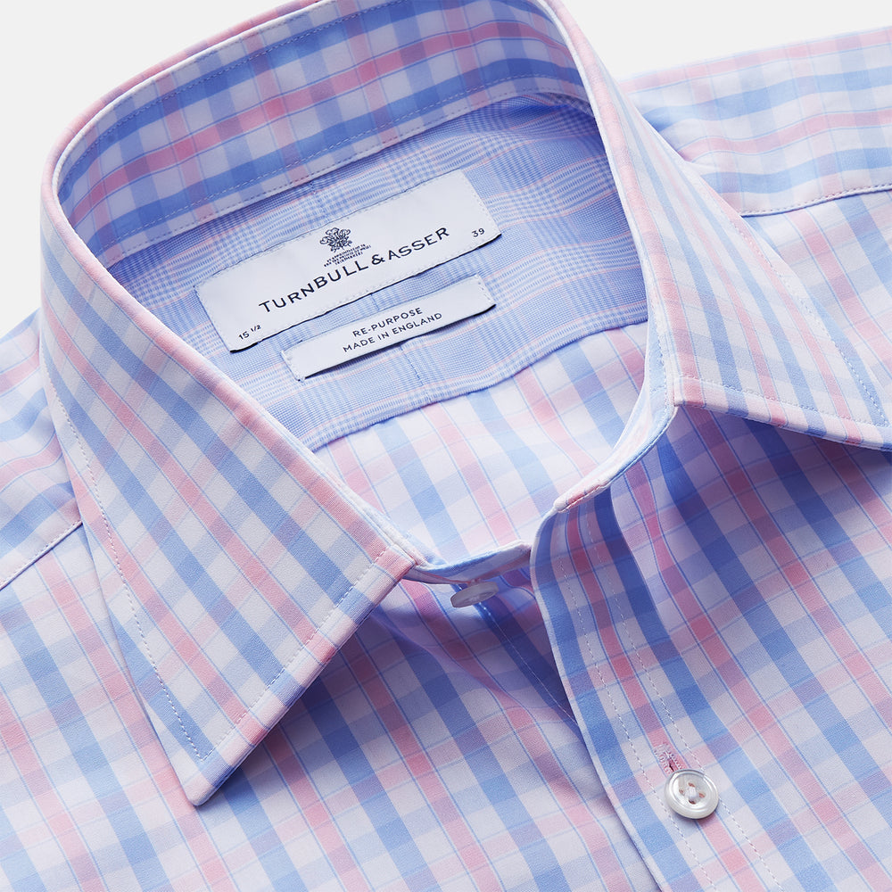The Turnbull & Asser Red and Blue Multi Check Cotton RE-PURPOSE Mayfair shirt is a sustainable, long-sleeve button-up with a collar and cuffed sleeves, crafted from recycled fabrics and shown laid flat on a white background.