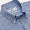 View 3 of product The Turnbull & Asser Pale Blue Multi Check Cotton Weekend Fit Williams Shirt features short sleeves, a pointed collar, single chest pocket, and premium Italian cotton with a subtle checkered pattern, shown on a white background.