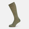 View 1 of product The Forest Green Linen Mid-Length Sock by Turnbull & Asser features a ribbed texture and is shown upright on a plain white background. Made from breathable linen, it offers comfort and style for everyday wear.