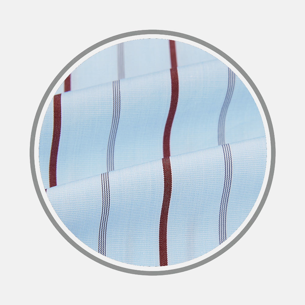 Close-up of Turnbull & Asser's BURGUNDY WIDE PINSTRIPE FABRIC, featuring light blue material with wide vertical burgundy and gray stripes, displayed in a circular frame on a light gray background.
