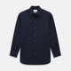 The NAVY BLUE WINDSOR SHIRT by Turnbull & Asser features long sleeves, a classic Windsor collar, white buttons, and buttoned cuffs—highlighting refined British craftsmanship against a plain white background.