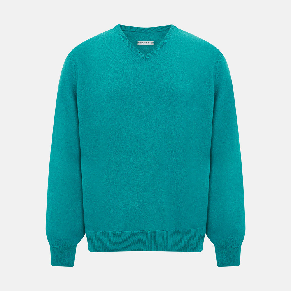 The Turnbull & Asser Turquoise Cashmere V-neck Jumper features long sleeves with ribbed cuffs and hem, displayed on a plain white background—a chic knitwear addition.