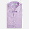 View 5 of product The Turnbull & Asser Purple Pink Mayfair Shirt is a men's formal, long-sleeve button-up with a classic collar and buttoned cuffs, shown in light purple against a plain white background.