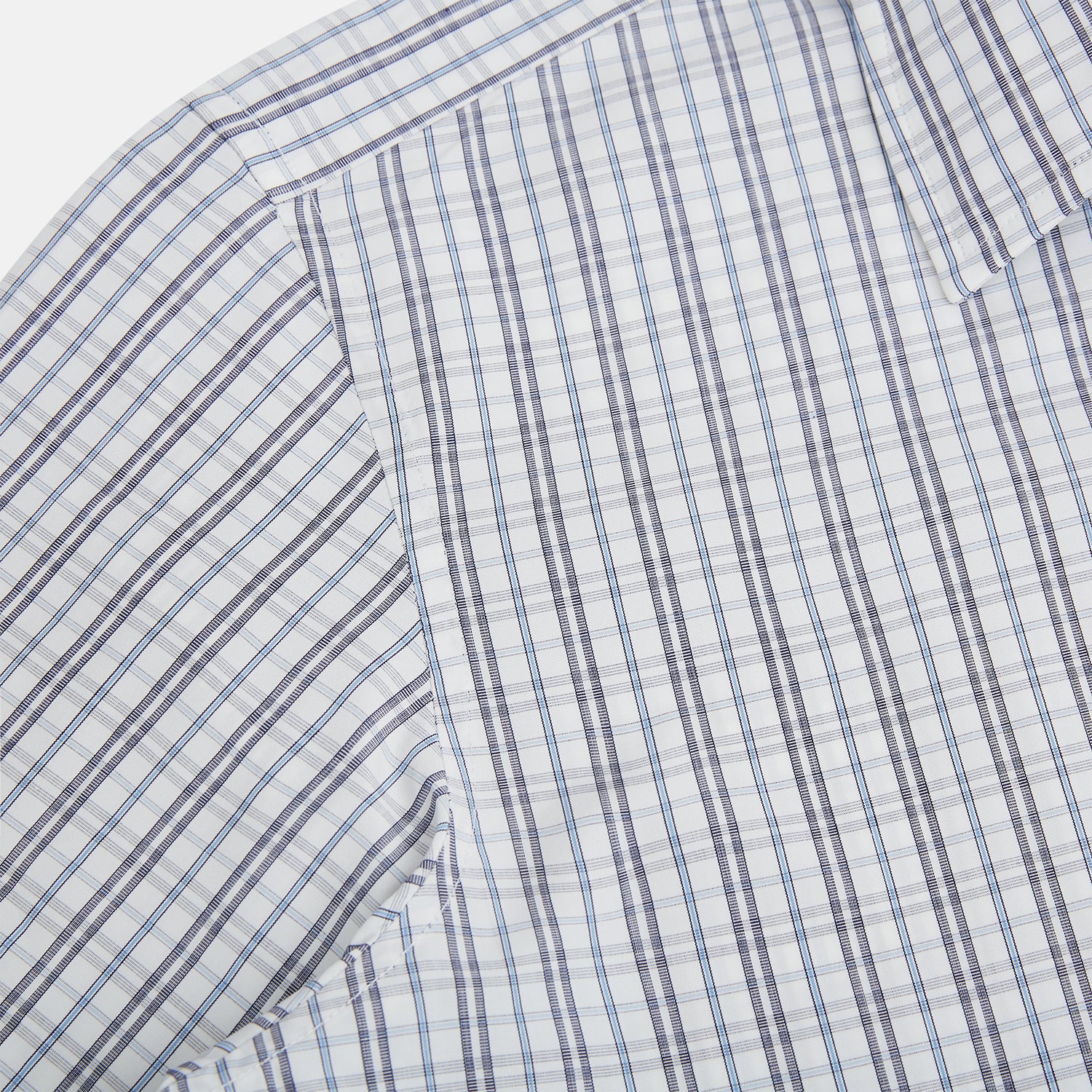 View 6 of product The Turnbull & Asser Navy and Blue Multi Tattersall Westminster Shirt features long sleeves, a button-down style, and a Turnbull collar in a blue and gray check pattern on white, laid flat against a white background.