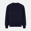 View 3 of product The Turnbull & Asser Navy Fine Merino V-Neck Jumper is displayed against a white background, featuring ribbed cuffs and hem for timeless style in a classic, plain long-sleeve design.