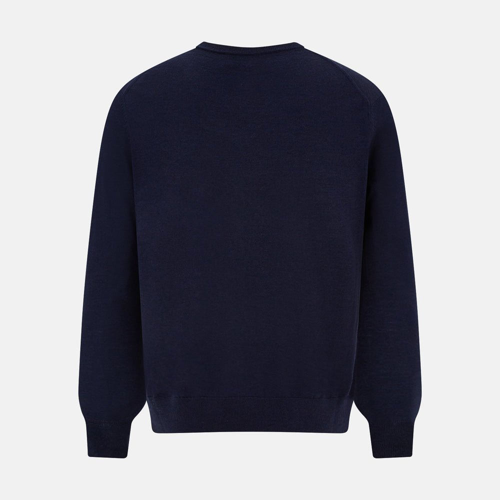 The Turnbull & Asser Navy Fine Merino V-Neck Jumper is displayed against a white background, featuring ribbed cuffs and hem for timeless style in a classic, plain long-sleeve design.