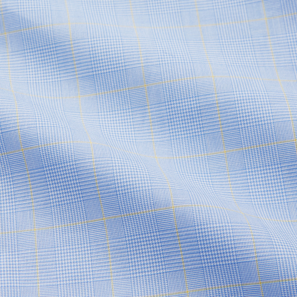 A Turnbull & Asser Yellow and Blue Prince of Wales Check Mayfair Shirt with white buttons and a classic collar, laid flat on a white background.