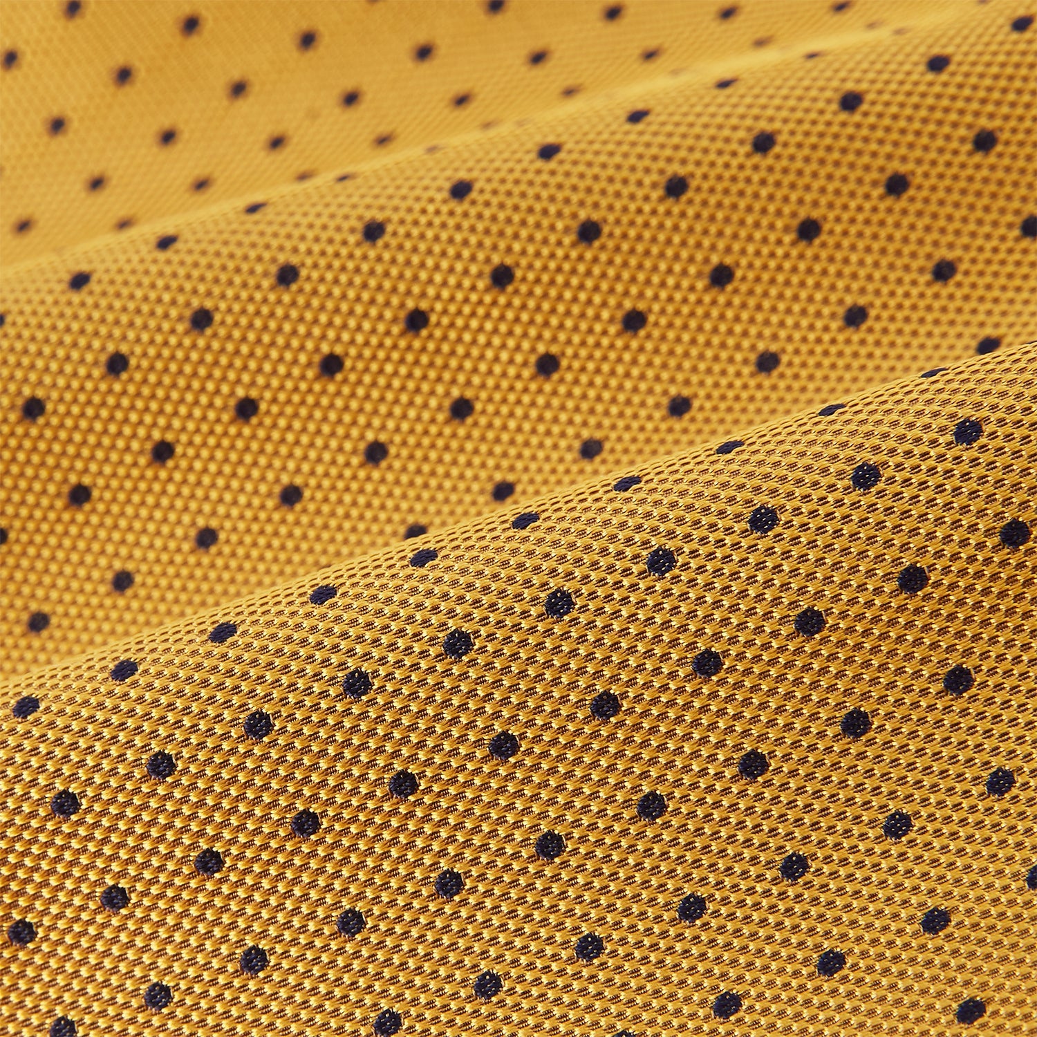 View 4 of product A refined formal accessory, the Turnbull & Asser Navy and Yellow Micro Dot Silk Cravat features a textured silk fabric with small yellow micro dots—perfectly complementing your pocket square for an elegant look.