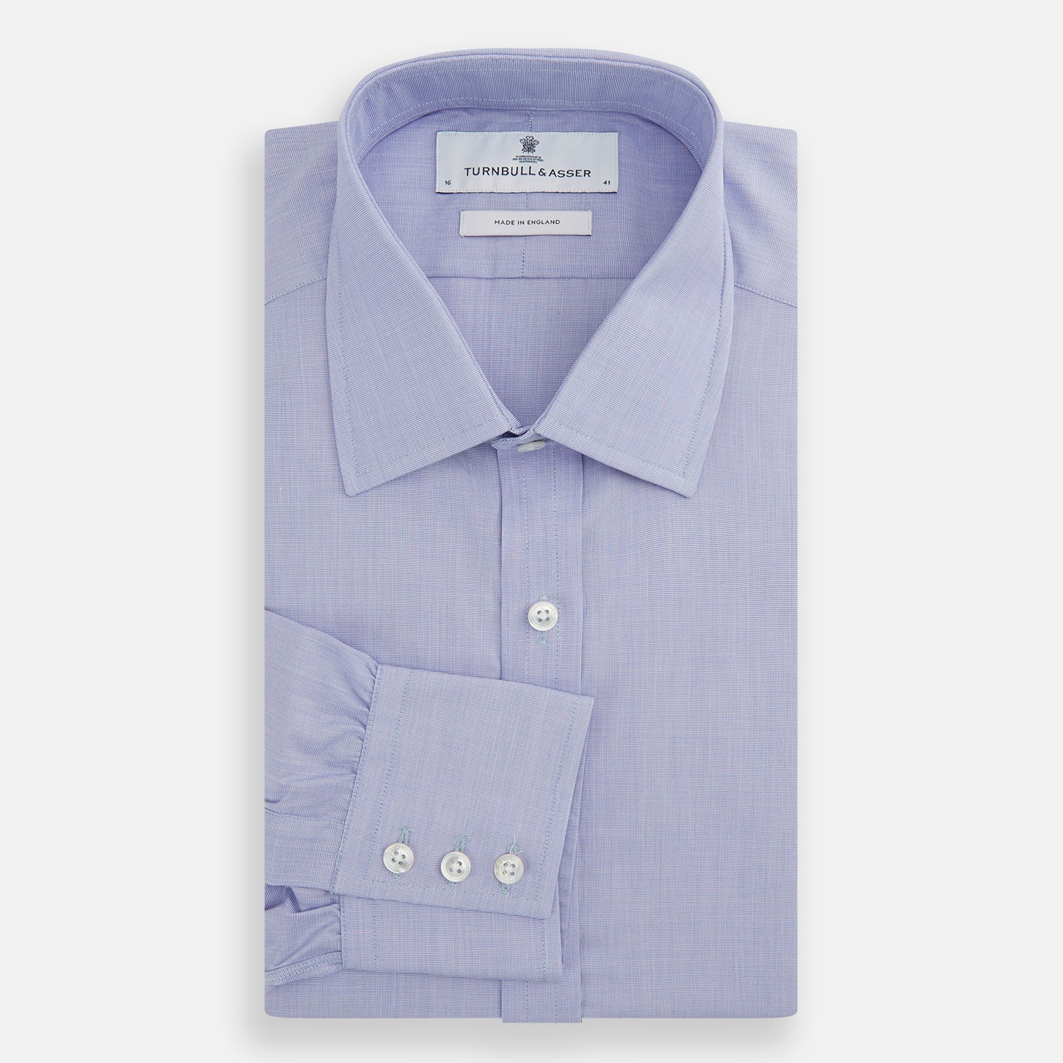 View 5 of product The Turnbull & Asser Blue End-on-End Cotton Shirt features a T&A collar and 3-button cuffs, perfect for pairing with a navy suit or smart ensemble, and is displayed flat against a white background.